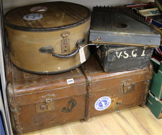 Three vintage cases and a zither